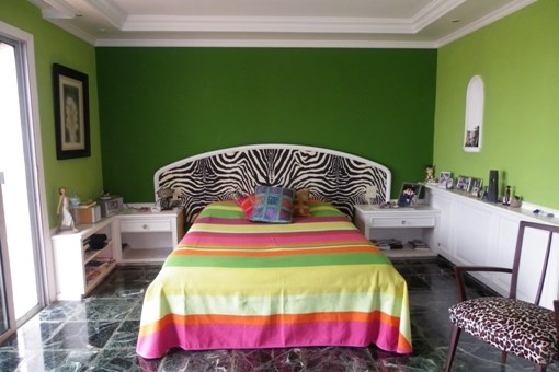 Dormitorio con salida al jardín